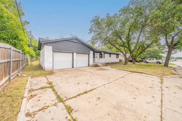 garage featuring a yard