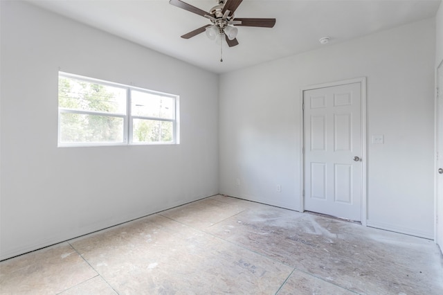 unfurnished room with ceiling fan