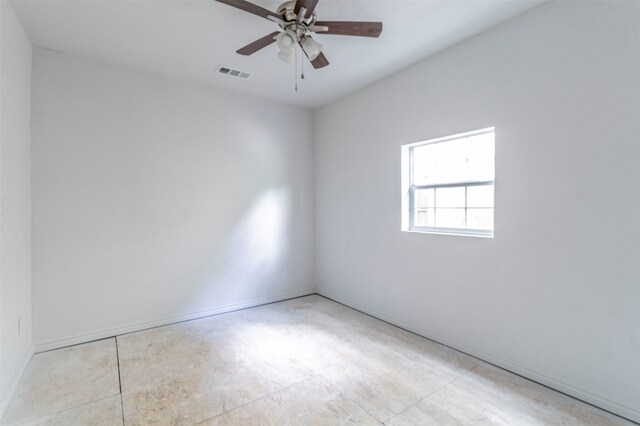 unfurnished room featuring ceiling fan