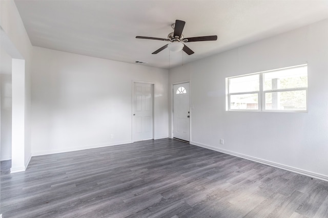 unfurnished room with hardwood / wood-style floors and ceiling fan