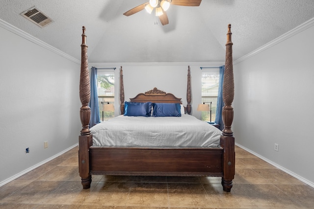 bedroom with ceiling fan, crown molding, and a textured ceiling