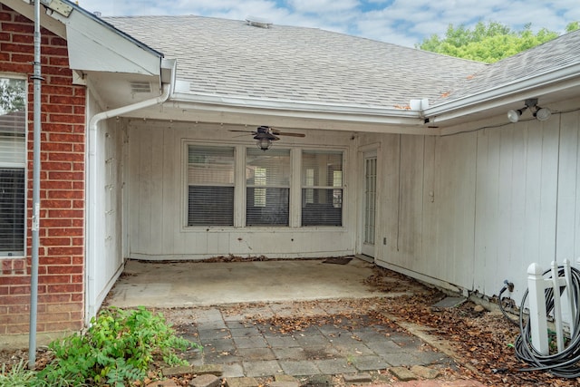 doorway to property featuring a patio and ceiling fan