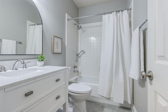 full bathroom featuring tile patterned flooring, vanity, toilet, and shower / bath combo with shower curtain