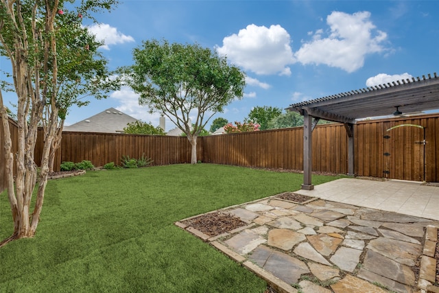 view of yard with a pergola and a patio