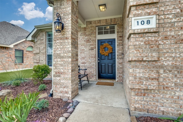 property entrance featuring covered porch