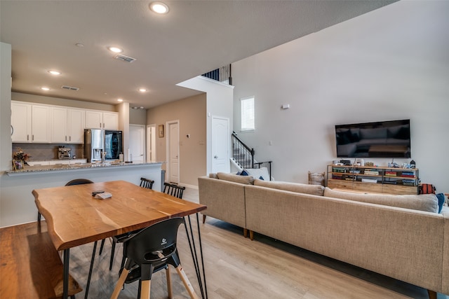 dining room featuring light hardwood / wood-style flooring