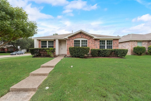 ranch-style house with a front yard