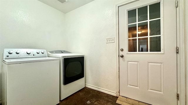 laundry area featuring washer and clothes dryer