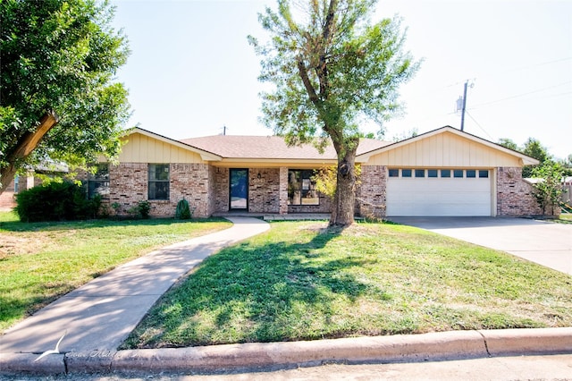 single story home featuring a front lawn and a garage