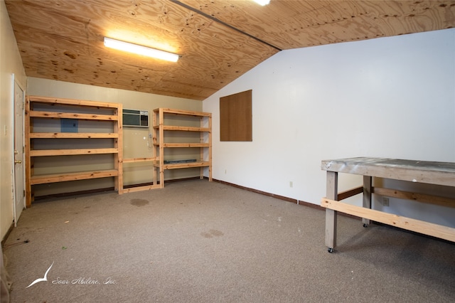 basement with carpet floors, a wall mounted AC, and wooden ceiling