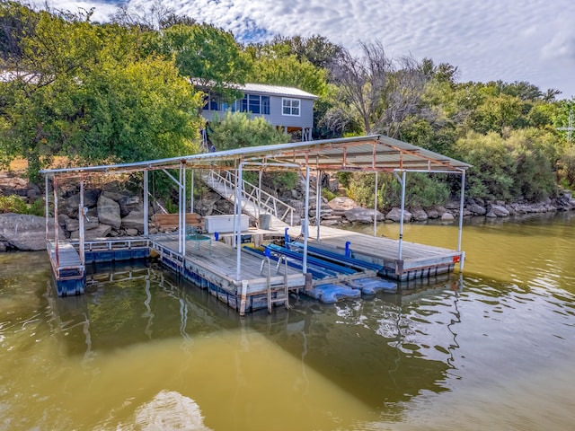 view of dock with a water view