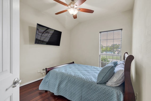 bedroom featuring lofted ceiling, ceiling fan, and dark hardwood / wood-style flooring