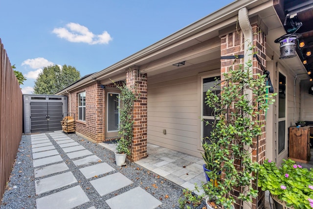 view of side of property with a patio