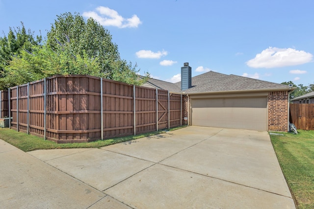 view of home's community featuring a garage