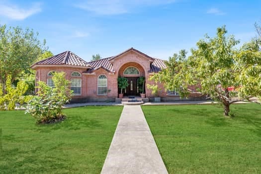 exterior space with a front lawn