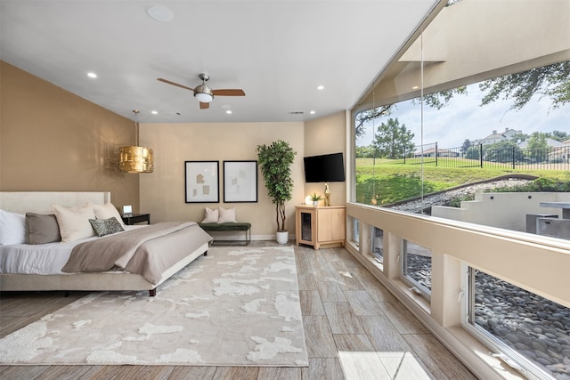 bedroom featuring ceiling fan and light hardwood / wood-style floors