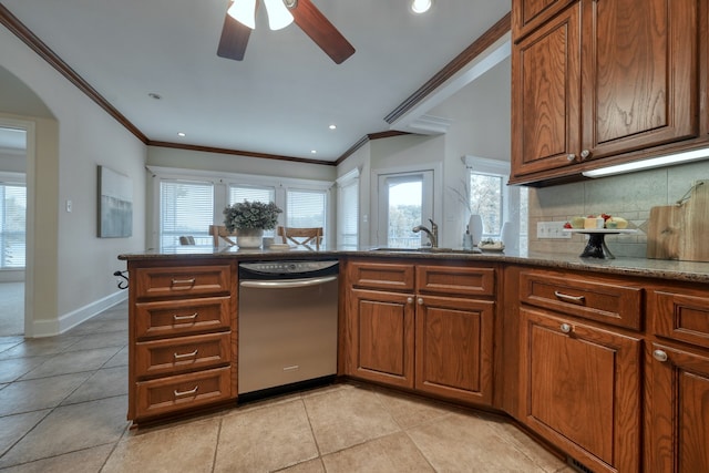 kitchen with dishwasher, a healthy amount of sunlight, sink, and ceiling fan