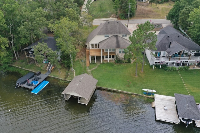 drone / aerial view with a water view