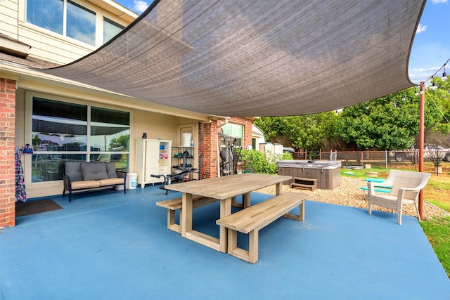 view of patio featuring a hot tub