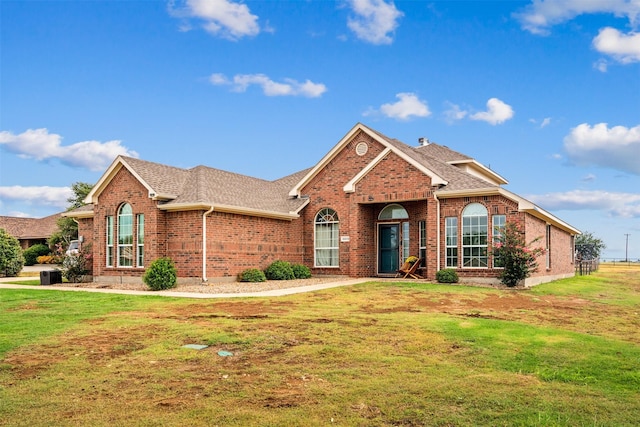 view of property with a front lawn