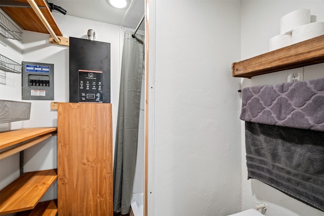 bathroom with a shower with shower curtain