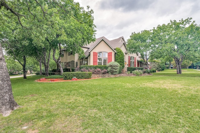 view of front of house with a front lawn