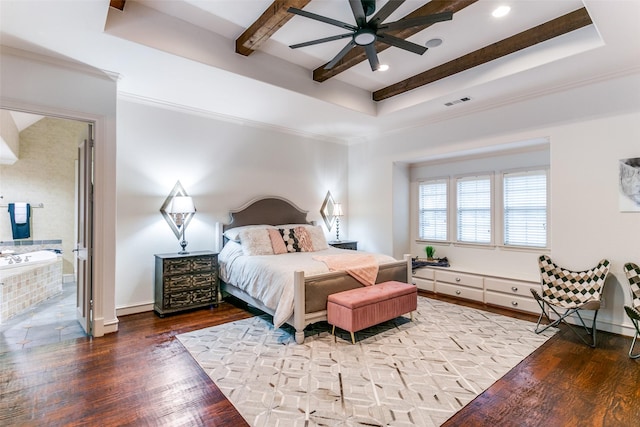 bedroom featuring a tray ceiling, hardwood / wood-style floors, and beam ceiling