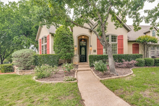 view of front of home with a front yard