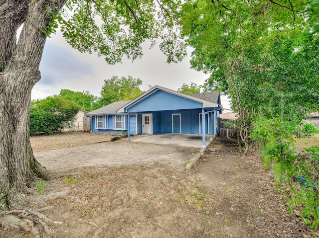 view of front of house with a carport