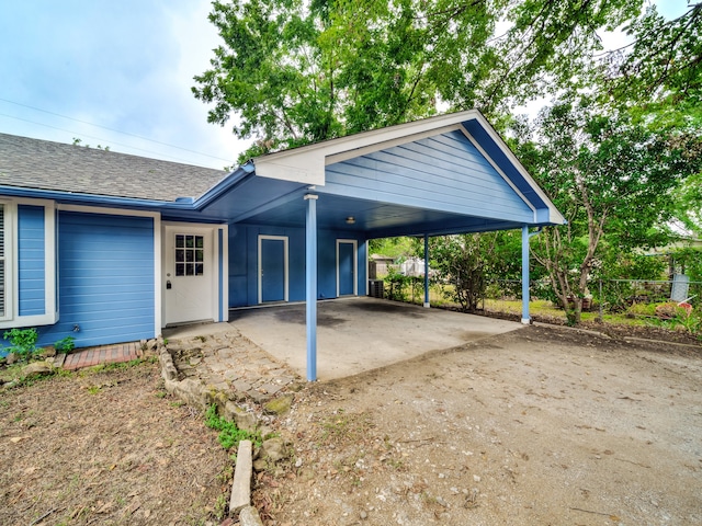 exterior space featuring a carport