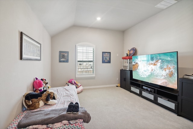 playroom featuring light colored carpet and vaulted ceiling