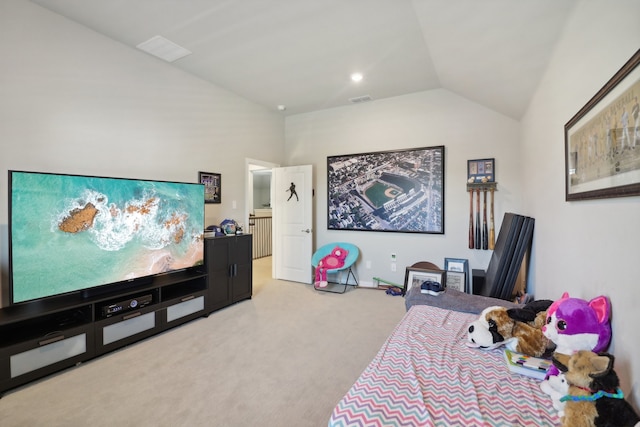 bedroom featuring light colored carpet and vaulted ceiling