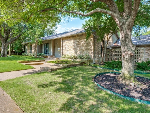 10807 Dove Brook Cir, Dallas, TX 75230 - view of front facade featuring a front lawn and brick siding