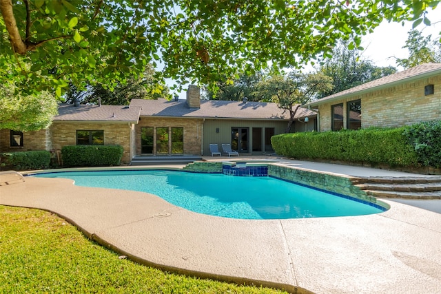 view of pool featuring a patio area