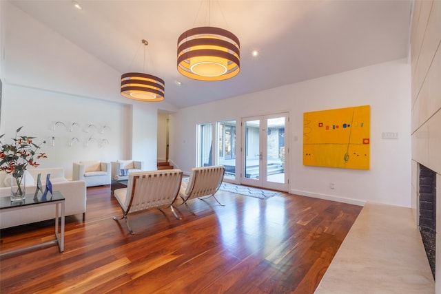 10807 Dove Brook Cir, Dallas, TX 75230 - living area with wood finished floors, a fireplace, and high vaulted ceiling