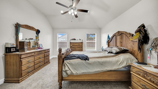 bedroom with lofted ceiling, ceiling fan, and carpet floors