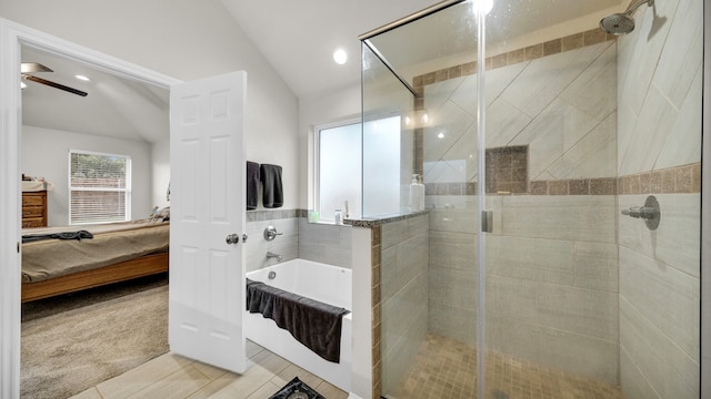 bathroom featuring tile patterned floors, vaulted ceiling, ceiling fan, and a shower with shower door