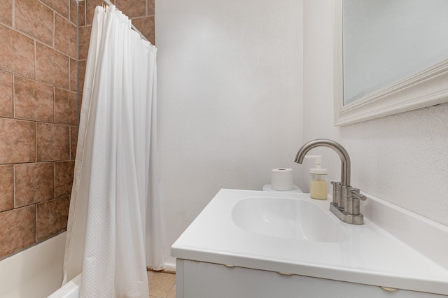 bathroom with vanity, tile patterned floors, and shower / bath combination with curtain