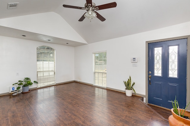 foyer entrance with dark wood-type flooring, ceiling fan, and high vaulted ceiling