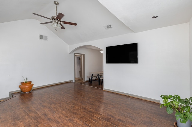 empty room featuring high vaulted ceiling, ceiling fan, and dark hardwood / wood-style flooring