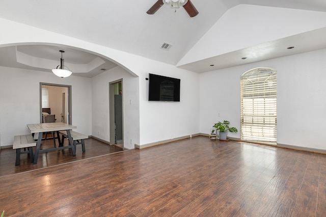 unfurnished room with high vaulted ceiling, ceiling fan, and dark hardwood / wood-style floors