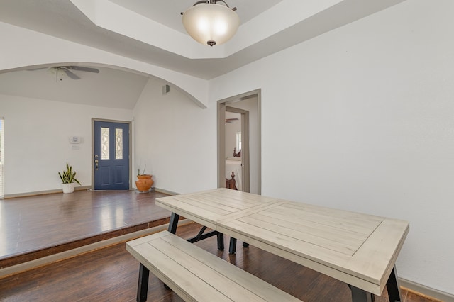 dining space with hardwood / wood-style flooring and ceiling fan