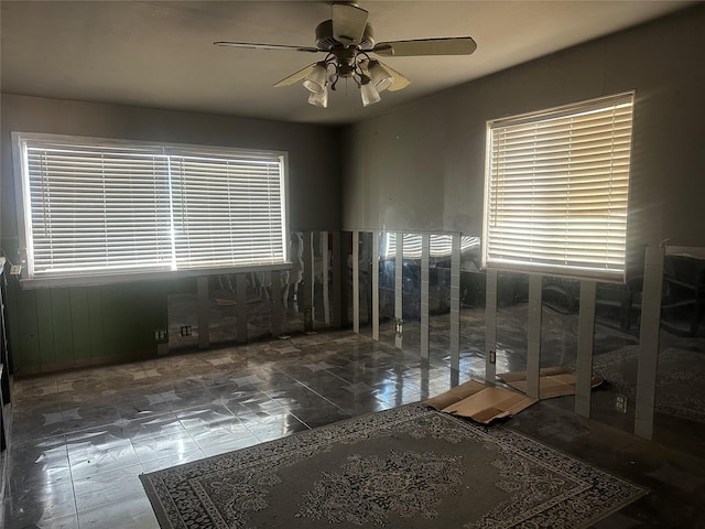 empty room featuring ceiling fan