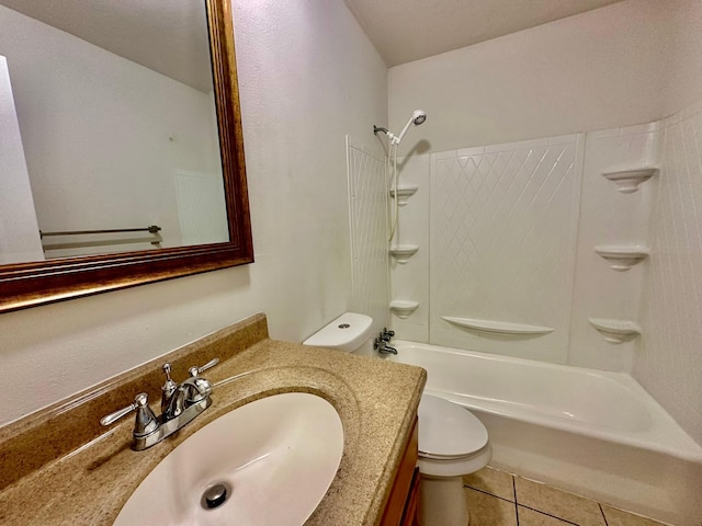 full bath featuring tile patterned floors, shower / bath combination, toilet, and vanity