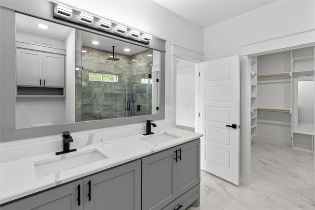 bathroom with vanity and walk in shower