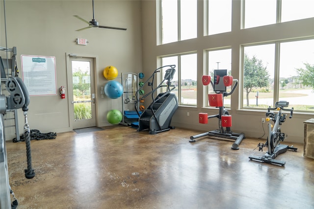 gym with concrete flooring and ceiling fan