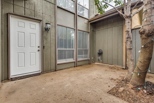 property entrance with a patio