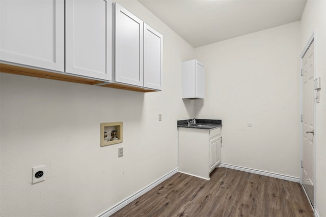 laundry room with cabinets, sink, washer hookup, dark hardwood / wood-style floors, and hookup for an electric dryer