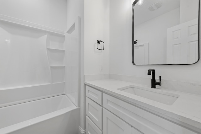 bathroom featuring shower / bathing tub combination and vanity