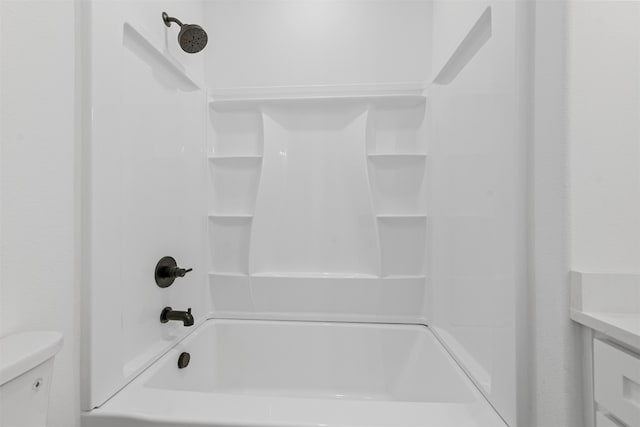 full bathroom featuring vanity, toilet, and bathing tub / shower combination